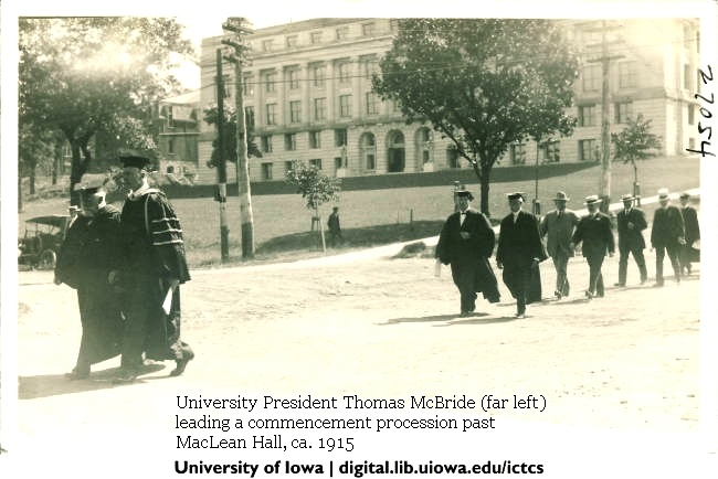 University President Thomas McBride leading a commencement procession past MacLean Hall in 1915